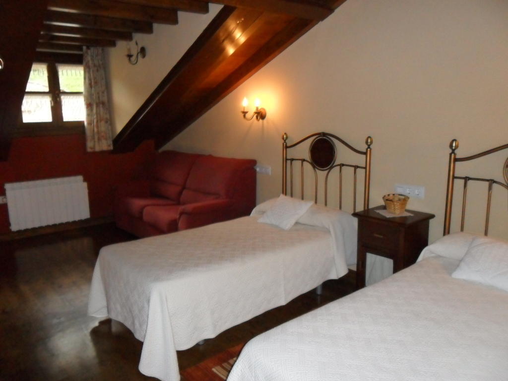Apartamentos Rurales Los Villares Colunga Habitación foto